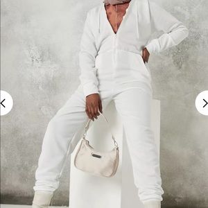 white hooded zip up jumpsuit